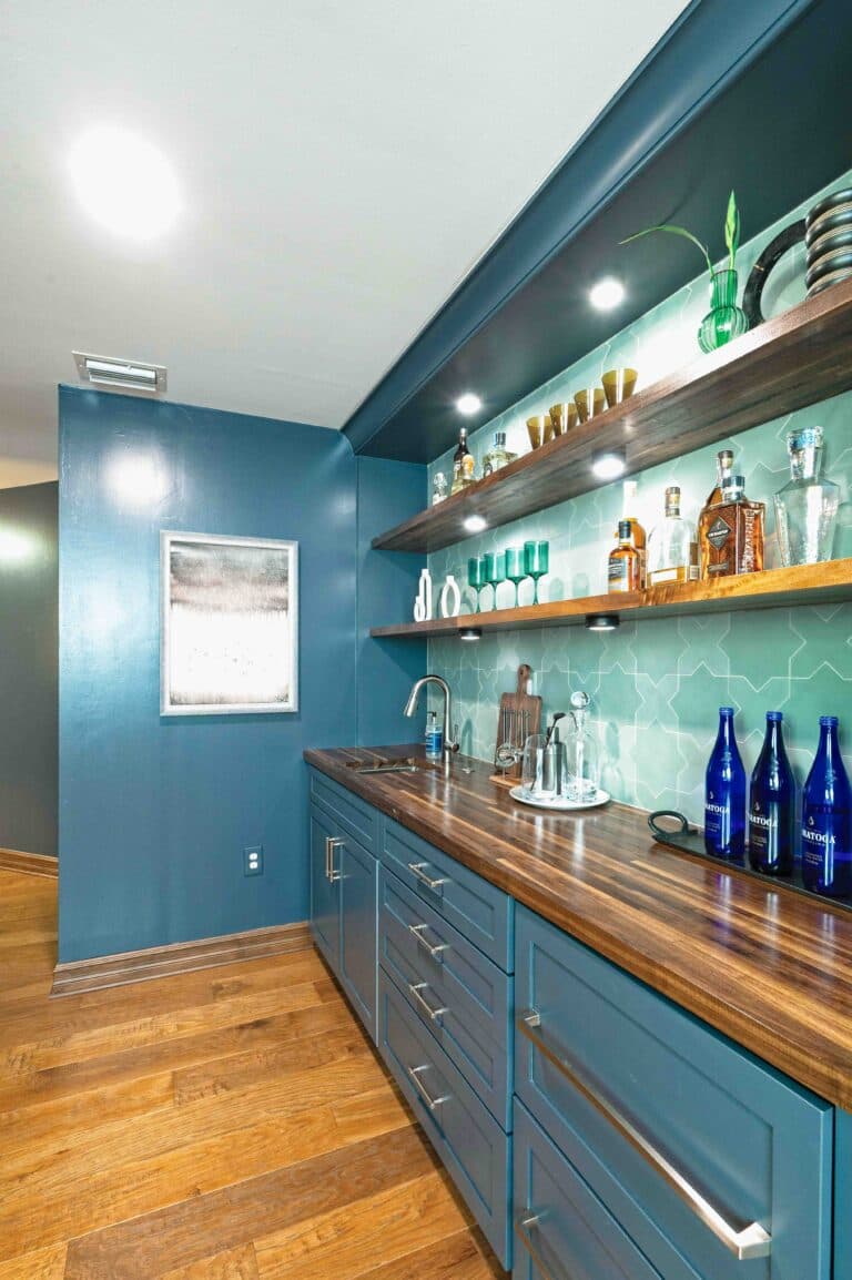 Custom home bar with pendant lighting